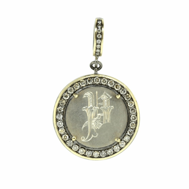 Love tokens reached their peak popularity during the Victorian era but are believed to have originated somewhere in Great Britain during the 1500’s. Often Love Tokens were exchanged between sweethearts as “tokens of love” or even marriage proposals. Love Tokens are generally defined as monetary coins from which one side (or sometimes both sides) have been smoothed down flat and engraved with names, phrases, monograms, and sometimes even pictorials.
Love Token Engraved with "P"