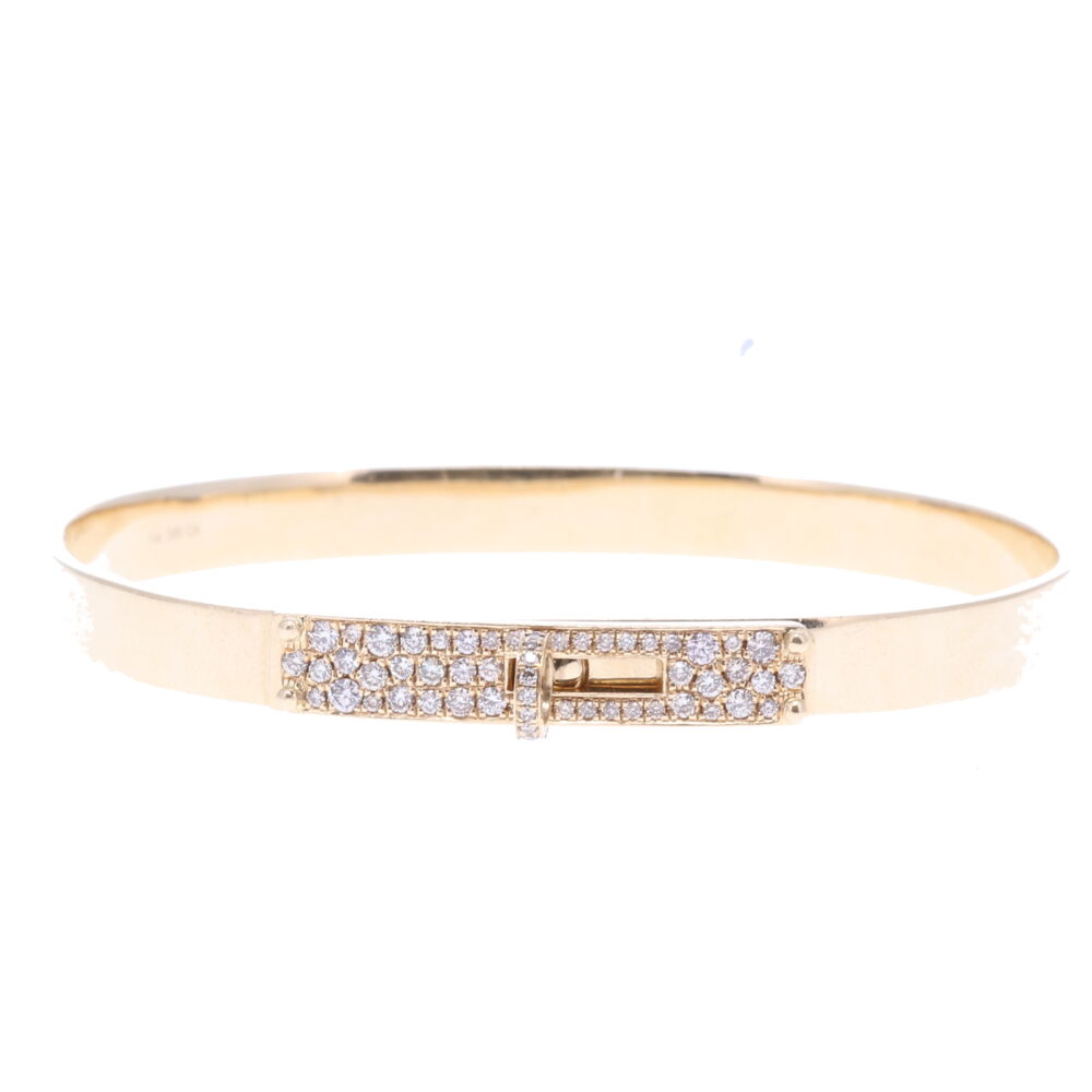This bracelet is perfect to display your Cynthia Ann pendants. It's constructed of 14k yellow gold 23.2g and champagne diamond 0.83 tcw. Size 7. Pave Diamond Hinged Display Bracelet
