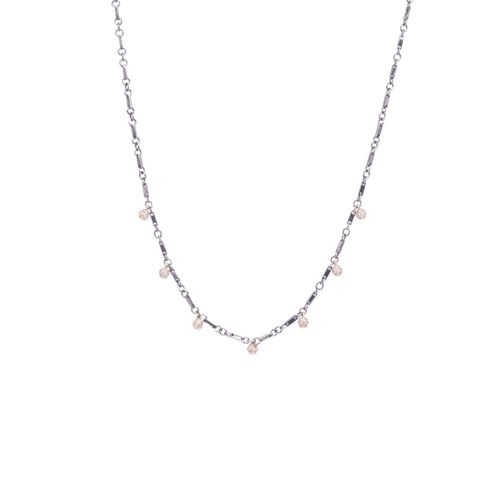 This polished handmade Rhodium Sterling chain with seven 14k Yellow Gold and Diamond spheres hangs at 17" or 18". There's 0.66 TCW Diamond, and 5.08g 14k Gold. Tri Colored Diamond Sphere Necklace 18"