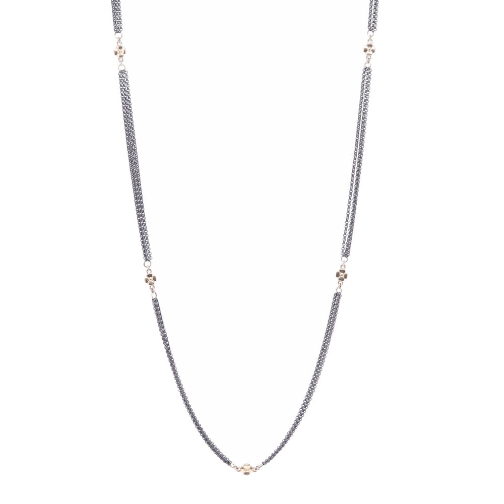 Handcrafted 14k gold cross stations are connected with three smaller rhodium sterling chains throughout the necklace. This chain consists of 6.07 g 14k Gold and Rhodium Sterling. Cross Station Chain 30"