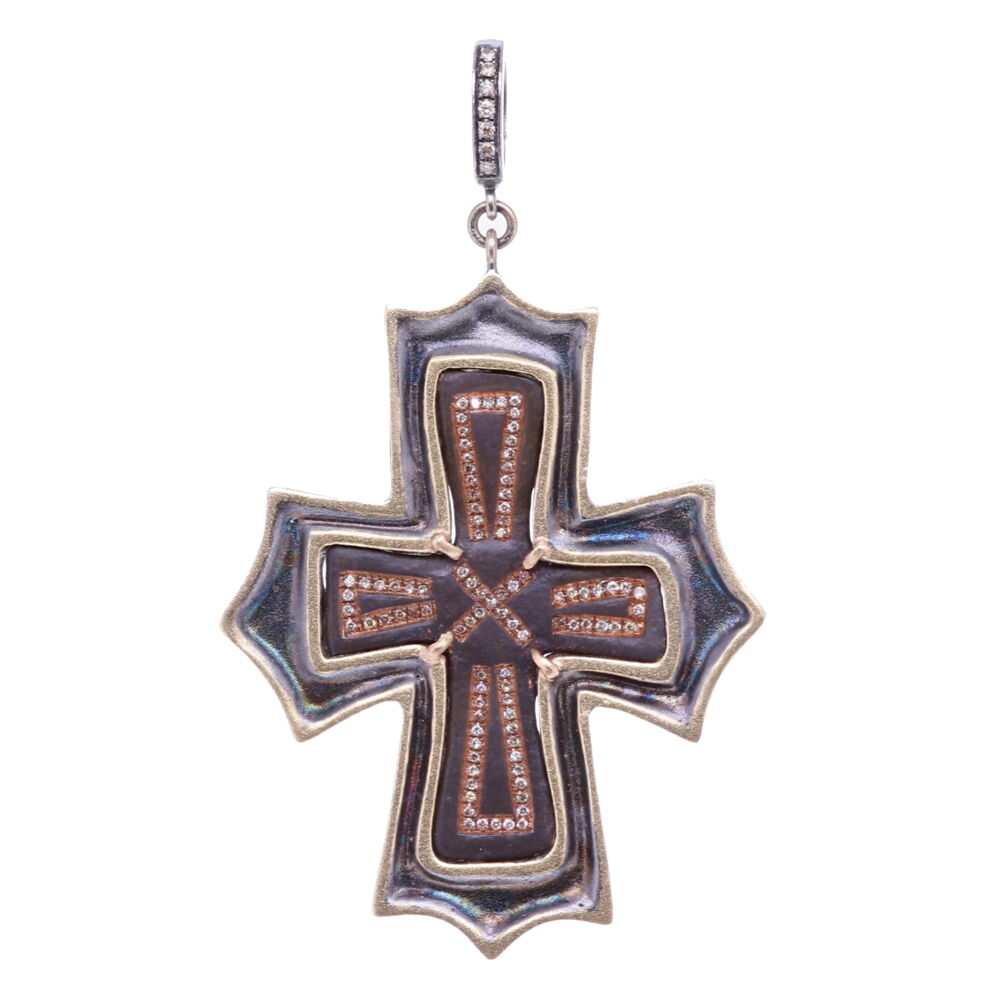 This ancient Byzantine cross has been set inside a Diamond 0.28 tcw and 14k Yellow Gold 6.6g bezel. The bale has a 4mm opening. The Byzantine cross has a natural brown patina from oxidizing over time. The diamond inlay is the only alteration done to this unique cross. A Byzantine (Latin) cross is defined by it's outwardly widening ends. Ancient Byzantine Cross Pendant