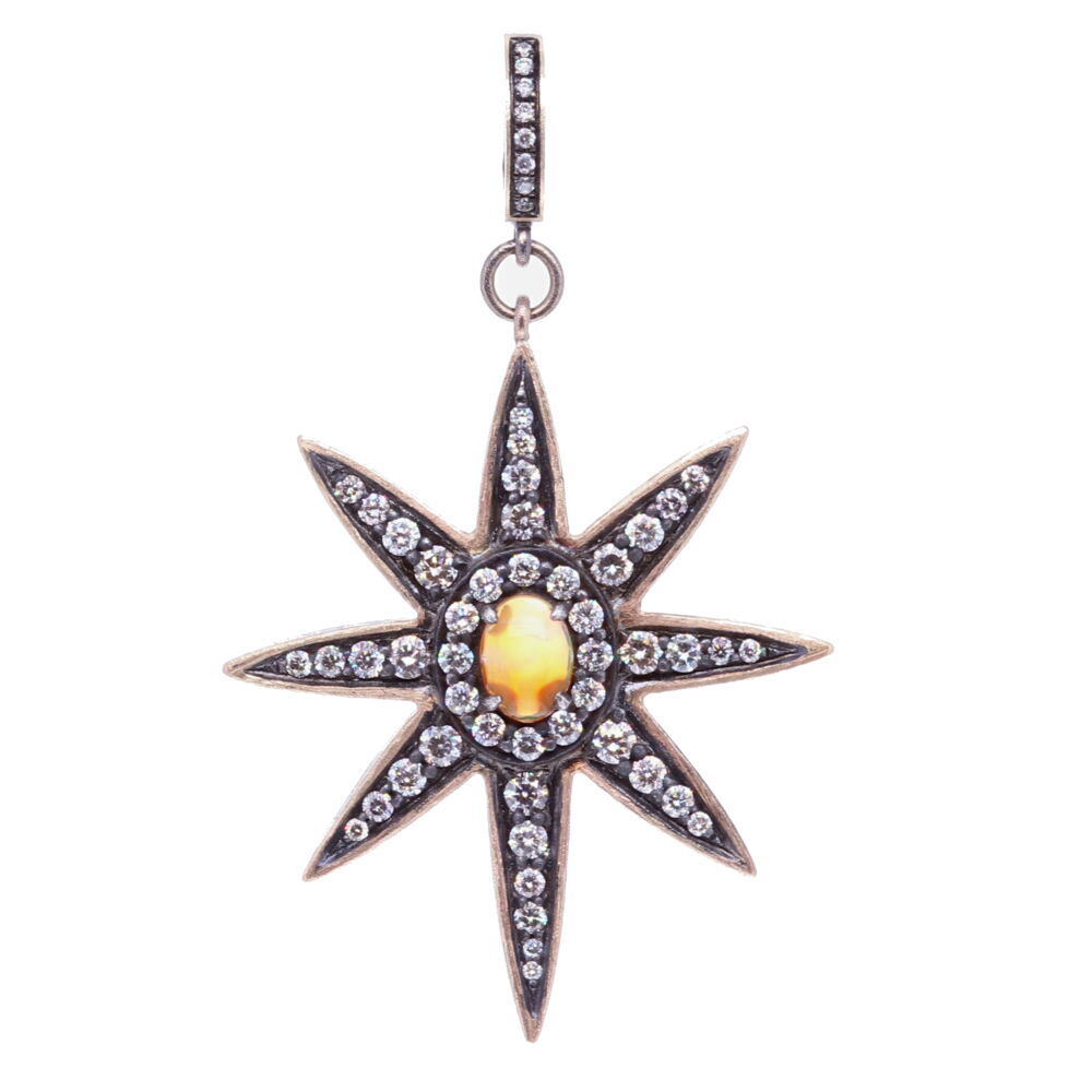This beautiful North Star symbolizes inspiration and hope. The opal set in the center is from Ethiopia. The bezel has 1.65 TCW Diamonds, 14k Yellow Gold 3.40g, and rhodium sterling silver. Large North Star Opal Pendant