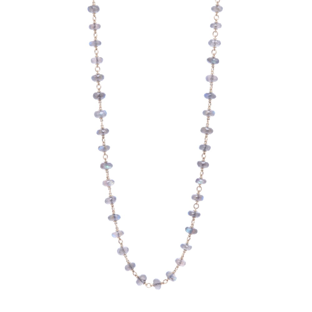 This 26" faceted labradorite necklace has a beautiful iridescent blue and green hue. The labradorite beads are strung with 14k Yellow Gold 11.52g. Labradorite Gold Necklace 26"