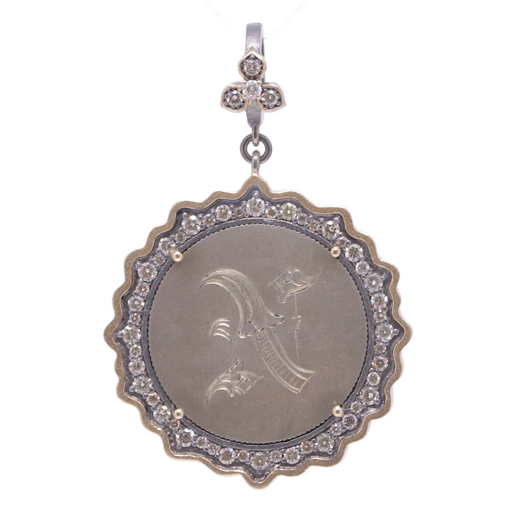 Love tokens reached their peak popularity during the Victorian era but are believed to have originated somewhere in Great Britain during the 1500’s. Often Love Tokens were exchanged between sweethearts as “tokens of love” or even marriage proposals. Love Tokens are generally defined as monetary coins from which one side (or sometimes both sides) have been smoothed down flat and engraved with names, phrases, monograms, and sometimes even pictorials.
Love Token Engraved With "N"