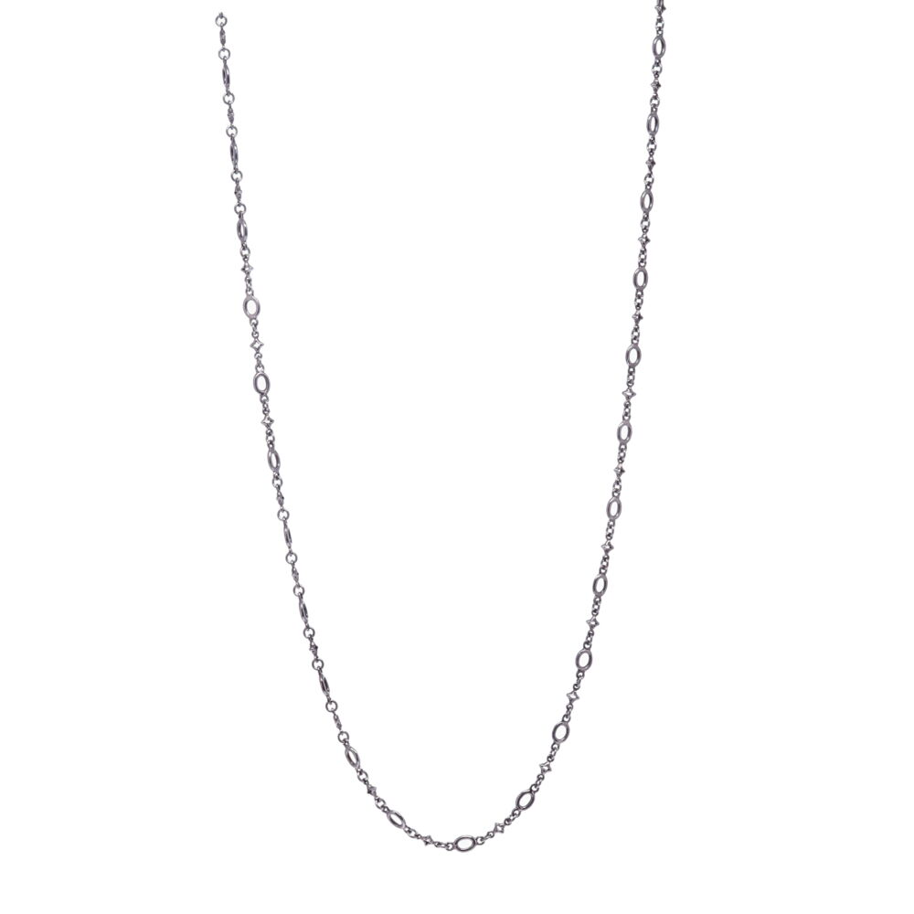 This handcrafted polished Rhodium Sterling oval & tiny star chain is delicate and decorative. This chain is one of the smallest gauges of chain in the collection. The clasp is 14k gold 2.18g and has a 7mm opening. Polished Oval & Tiny Star Link Chain