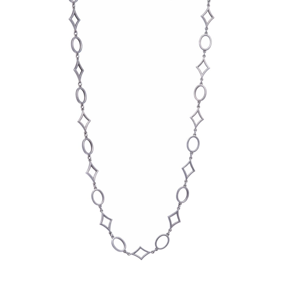 This handcrafted necklace is Rhodium Sterling. Each link is alternating from star to oval. The clasp has a 7mm opening and may clip onto any link to make the necklace shorter. Limited Edition Star Link Chain 18"