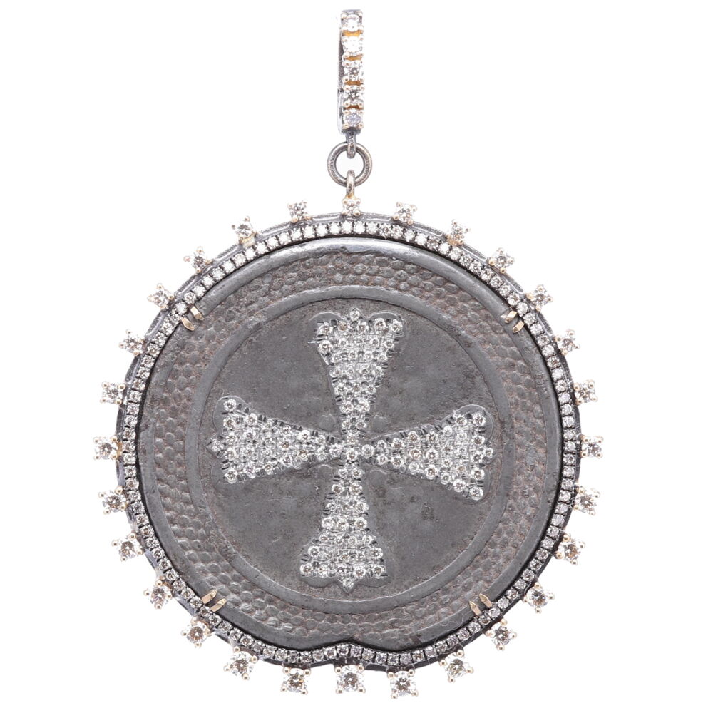 This original 17th Century Russian Maltese medal is set inside a Cynthia Ann bezel. The bezel consists of 14k yellow gold 4.91g, champagne diamonds 2.12 tcw, and rhodium sterling silver. The back displays Russia's coat of arms. The only alteration done to this original 1700's medal is diamond inlay on the original Maltese cross on the front. Cynthia Ann ancient + old collection consists of one of a kind pendants showcasing original antiquities, each are waiting to be re loved again. Russian Maltese 1700's Coat of Arms Pendant