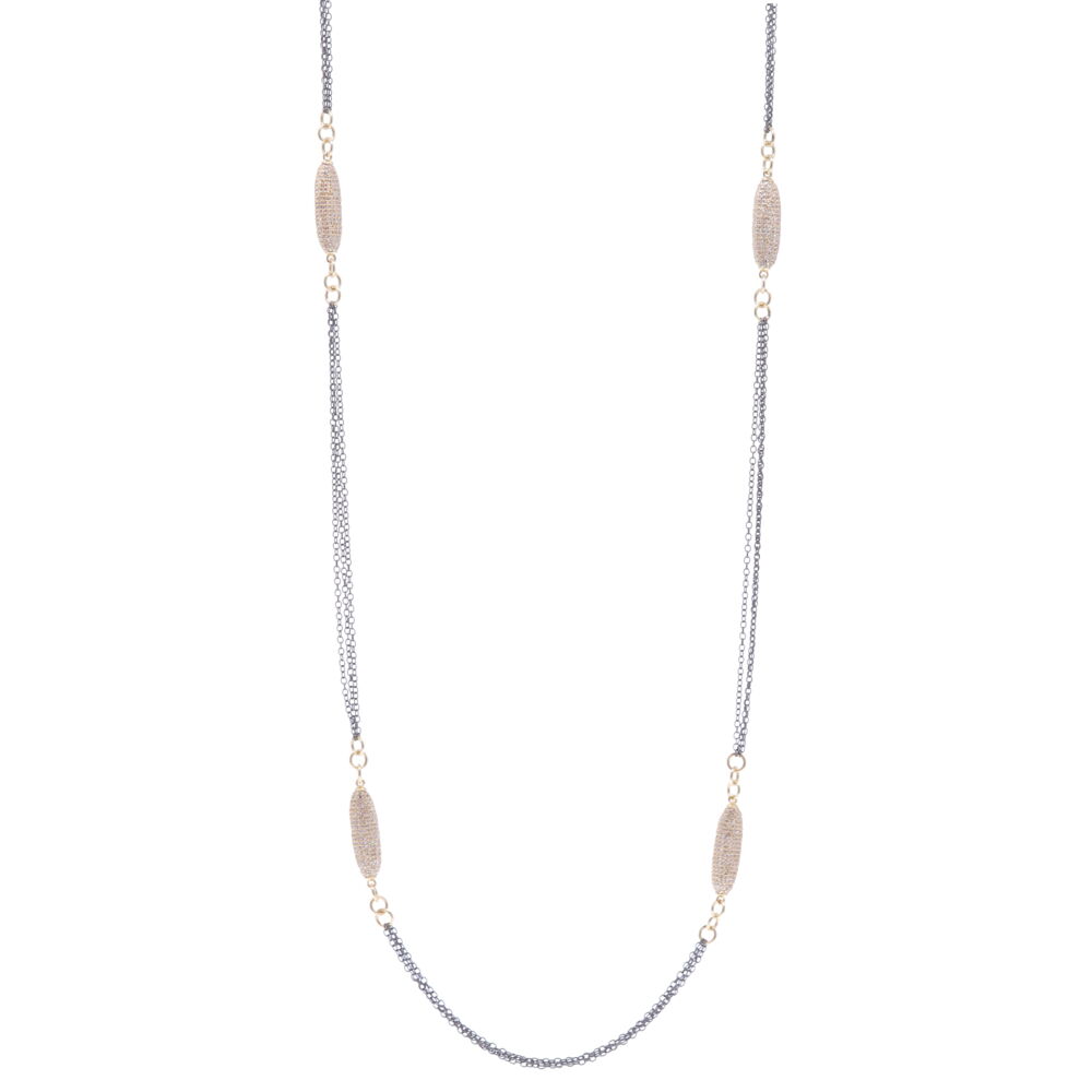 This beautiful 34" necklace has four elongated yellow gold sparkling diamond stations. There are three small gauge rhodium sterling chains strung in between. The diamond weight is 3.40 tcw, and 14k yellow gold 24.2g. This limited edition yellow gold oblong diamond chain is one of a kind. Limited Edition Yellow Oblong Diamond Chain 34"
