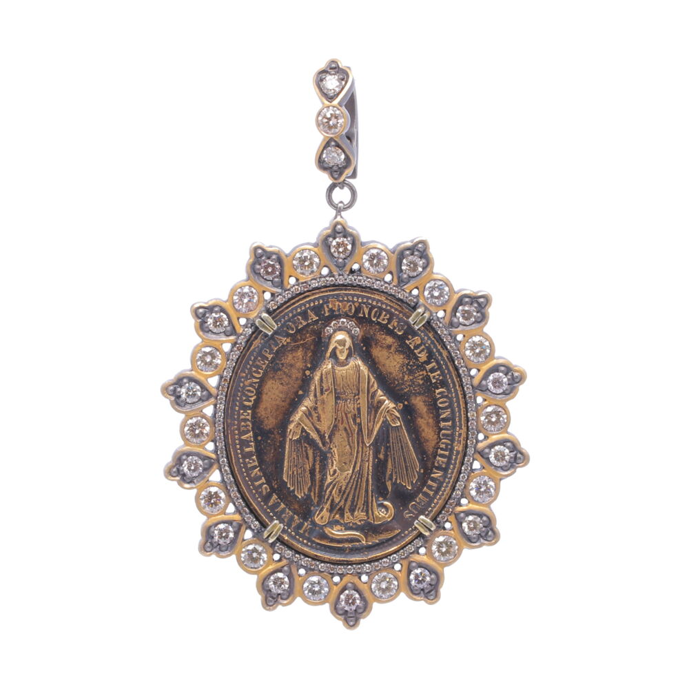 The face of this Miraculous Mary Latin medal translates to "Mary conceived without sin pray for us and you Confugientieus." The back translates to "S. Francisce Pray for us sinners." Cynthia Ann’s inspiration for her jewelry collection began as she was grieving the loss of her mother. Her spiritual journey led her to Europe where she started her precious collection of over 1,500 religious crosses and medals that date back to 450 A.D. through the early 1900’s. CynthiaAnn has “re-purposed” this Antique Miraculous Mary Medal for you to enjoy.
Antique Miraculous Mary Medal, Enhanced with an Inlayed Champagne Diamond Halo, Surrouned by a Champagne Diamond, 14k Yellow Gold and Black Rhodium Silver Shapes Bezel, Hanging from a Champagne Diamond, 14k Yellow Gold, and Black Rhodium Silver Openable Bale.
Champagne Diamond - 4.10tcw
14k Gold -
Black Rhodium Silver Latin Miraculous Mary Medal