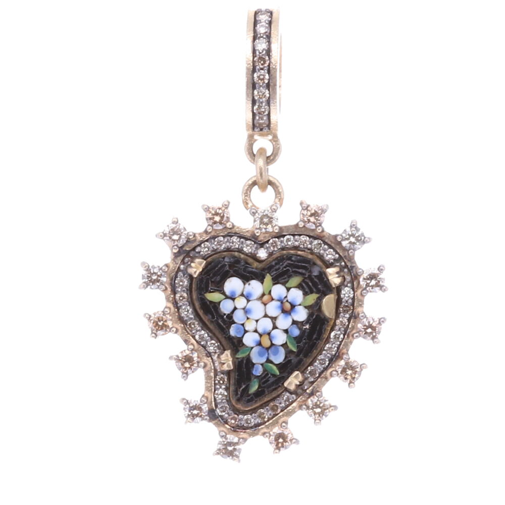 The original 1900's micro mosaic was handcrafted in Italy. It's set inside a 14k Yellow Gold 4.96g, Diamond 0.69 tcw bezel. The bale has a 4mm opening. The blue colored mosaic pieces form a series of abstract flowers. Flowers and plants were created by God they express divine goodness, truth, and beauty. Micro mosaics are handmade by artisans that use tiny pieces of glass (Tesserae) or enamel like pieces to construct a small figurative image. Micro Mosaic Heart Floral Pendant