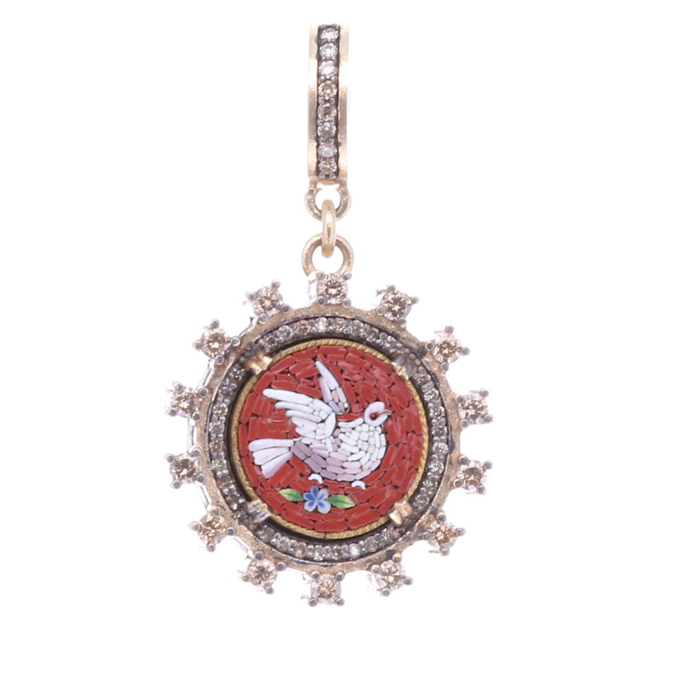 The original Italian micro mosaic was handcrafted in the mid 1800s. Surrounding the authentic micro mosaic is a decorative 14k yellow gold 4.45g, rhodium sterling, and diamond 0.82tcw bezel. The deep maroon color emphasizes the white dove facing right. Doves symbolize the Holy Spirit and send us important messages from the Divine. A dove is a reminder that there is always hope and peace if you seek it. This can be worn as not only a pendant or a charm on a bracelet. Red *right facing* Antique Italian Micro Mosaic Holy Spirit Dove Pendant