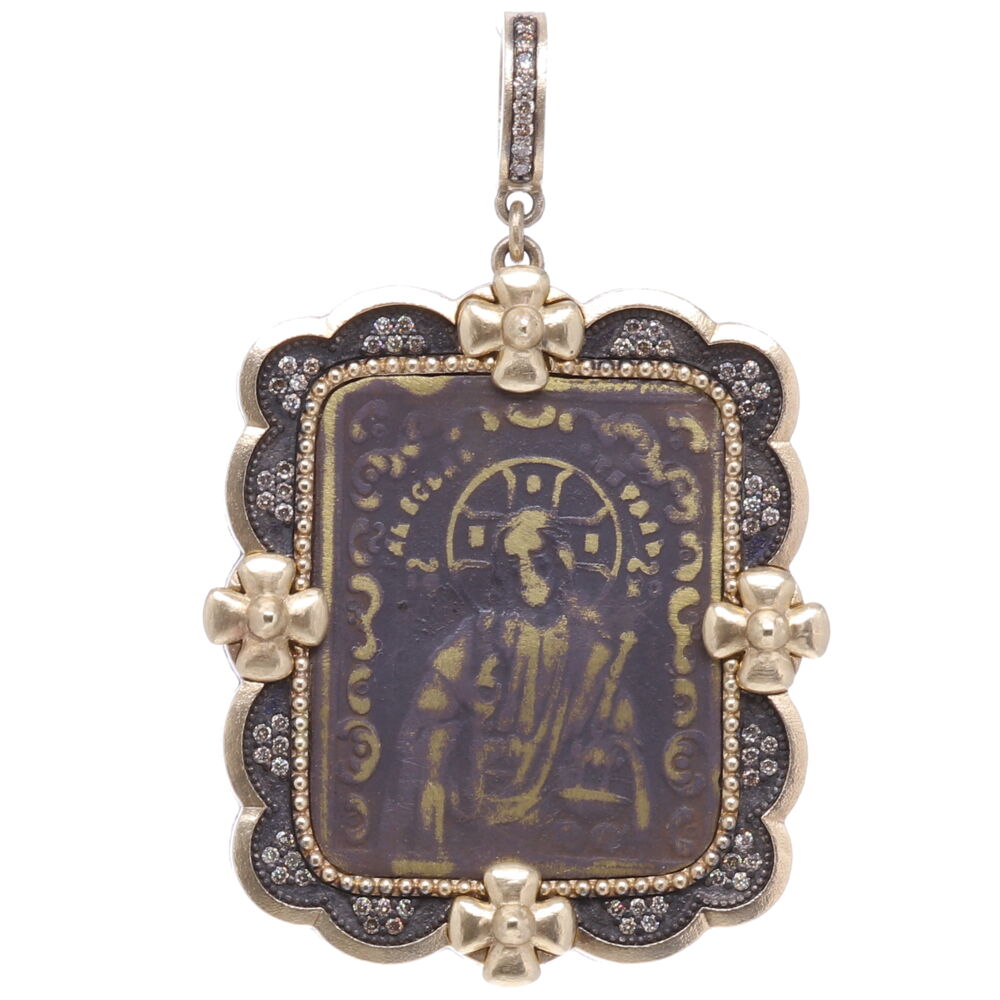 This Russian medal has Jesus depicted on the front with a Maltese Cross surrounding him in a halo like figure. On the back is a cross, to left and right "IC" and "XC" are engraved. This translates to "Bow to your Cross and Glorify Your Holy Resurrection". The Holy Lance is to the right of the cross it's the spear used by the Roman soldier Longinus to pierce Jesus' side when he was on the cross. The Holy Sponge is pictured to the right of the cross. This medal is set in a 14k Yellow Gold 7.7g, Rhodium sterling silver, and diamond 0.41tcw bezel. The bale has a 4mm opening. Antique Russian Resurrection Icon Medal