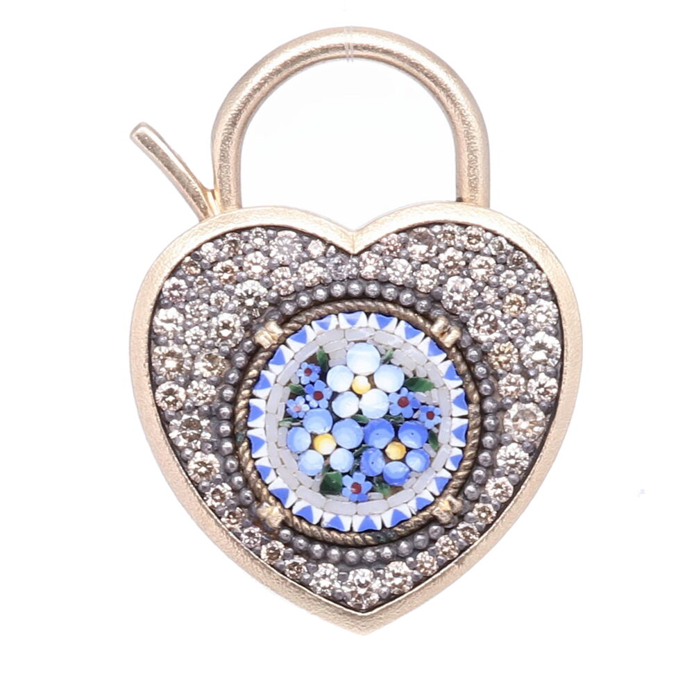 This beautiful Victorian style locket has an authentic 19c Italian micro mosaic floral motif in the center. The locket has an open-able top latch. A beautiful addition to any charm bracelet or worn as a pendant. The original micro mosaic is from the Grand Tour period. Students would travel overseas and collect small pictorials to bring back to their family, showing them a piece from their travels. This stunning piece has a total of 2.87g of 14k gold and a total diamond weight of 1.00 carat. Blue Italian Micro Mosaic Floral Heart Locket Pendant/Charm