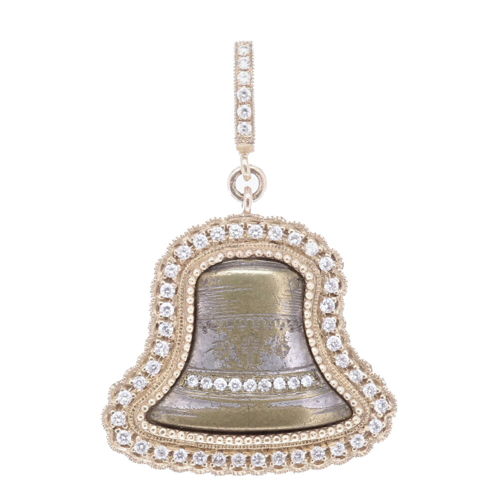 This antique bell medal has an original cross engraved on the front. This medal is set in a 14k Yellow Gold and Diamond bezel with a bale that has a 4mm opening. The only alteration is the diamond inlay on the medal itself. On the back of the medal the Sacred Heart of Jesus is displayed. Antique Bell Pendant with the Sacred Heart