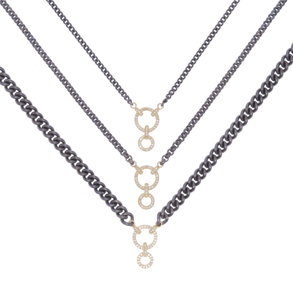 Handcrafted rhodium display chain that can hold 1-3 pendants comfortably. There are three options for chain style that can be at any length. The diamond weight is 0.32 tcw, with 3.10g of 14k gold. Classic Diamond Double Circle Display Necklace