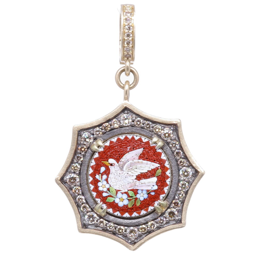 The original Italian micro mosaic was handcrafted during the Grand Tour period 1680-1880. Surrounding the authentic micro mosaic is a decorative 14k yellow gold 4.16g, rhodium sterling, and diamond 0.78 tcw bezel. The deep maroon color emphasizes the white dove facing left. Doves symbolize the Holy Spirit and send us important messages from the Divine. A dove is a reminder that there is always hope and peace if you seek it. This small sized pendant can be worn as a necklace or a charm on a bracelet. Italian Grand Tour Micro Mosaic Holy Spirit Dove Pendant