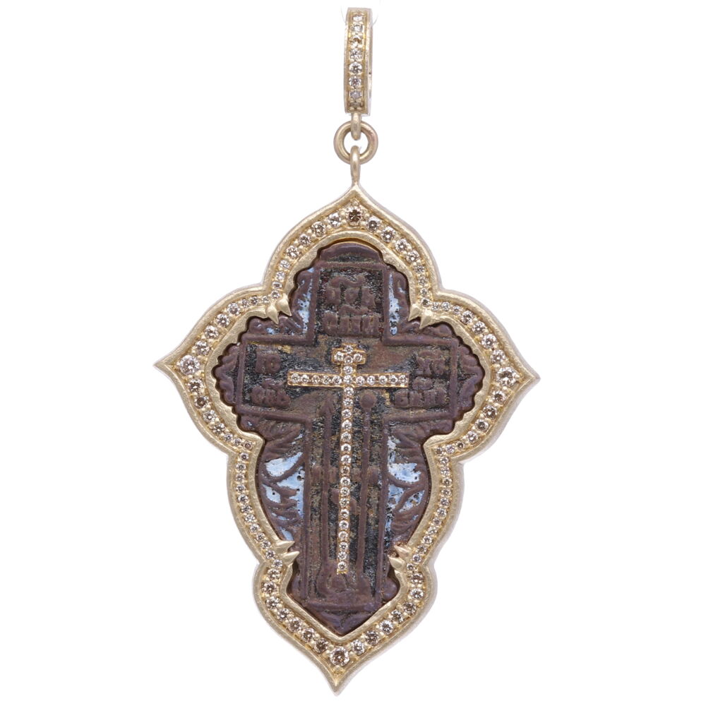 This antique Russian “Old Believers” Cross is defined by it’s straight lines, eight pointed cross and delicate details. The Old Believers were a protestant sect that broke from the Russian Orthodox Church in the 17th century. This original cross is set in a Cynthia Ann solid 14k yellow gold 15.94g and diamond 0.95tcw bezel. Large Old Believer Cross with Enamel Pendant