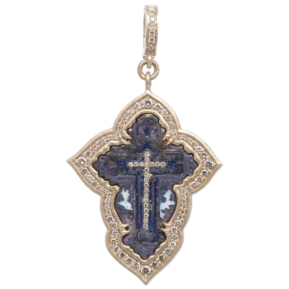 This antique Russian “Old Believers” Cross is defined by it’s straight lines and delicate details. The Old Believers were a protestant sect that broke from the Russian Orthodox Church in the 17th century. The antiquity is set in a solid 14k 14.35g yellow gold and diamond 0.80 tcw bezel. Small Old Believers Cross with Enamel Pendant