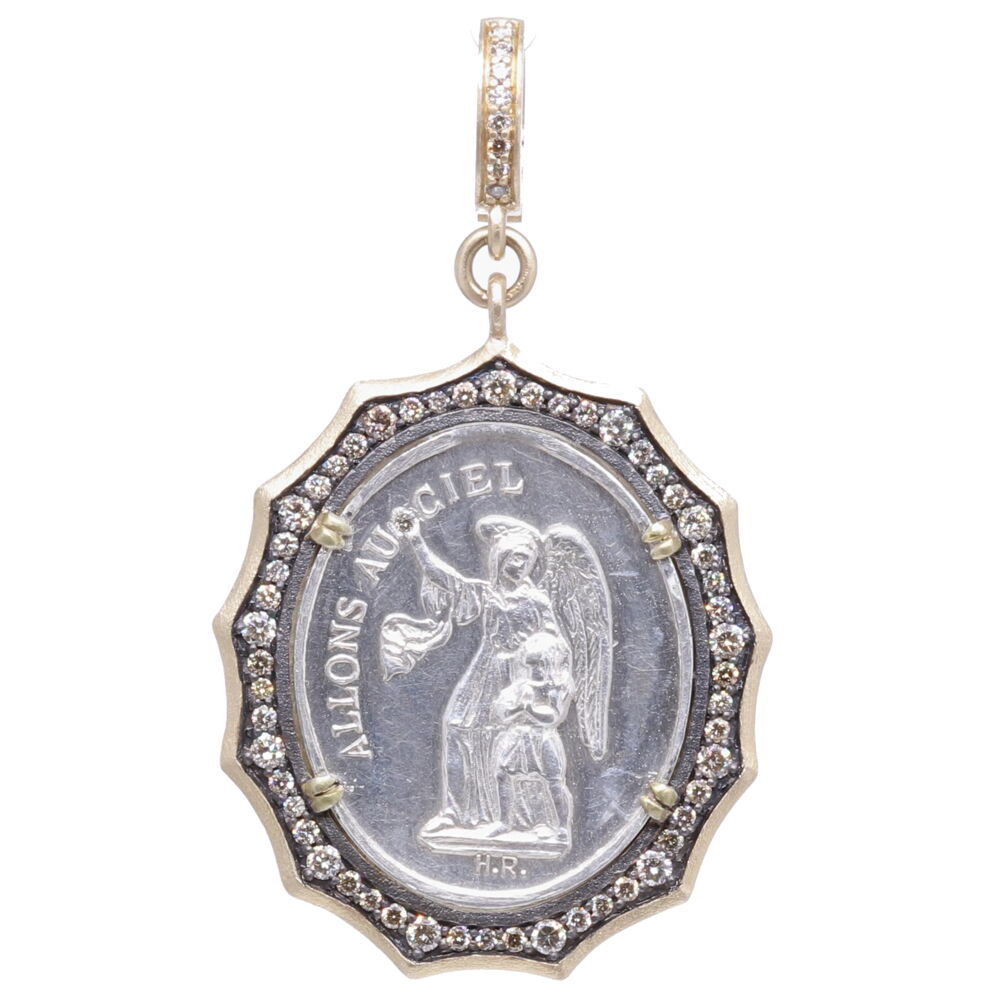 This antique silver French medal has a beautiful Guardian Angel on the front and translates to "To go to Heaven". On the back, " Here is our model". Your Guardian Angel has been with you since birth and will be with you once your pass out of body into spiritual realm. She is a reminder in your faith in God and that you are never alone. She is here is guide and protect you every step of the way. The bezel is constructed of champagne diamonds with 1.00 total carat weight. It has 2.99 grams of 14 karat gold and an open-able bale which will accommodate up to a 6mm chain. This beautiful pendant will be be a treasured family heirloom. Antique French Guardian Angel Pendant