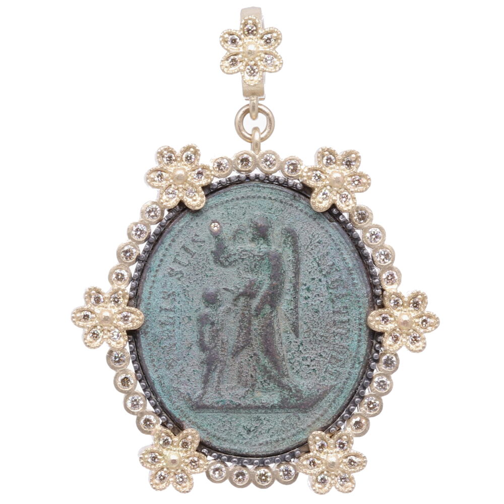 The front of this original French Guardian Angel medal translates to "Angels charge over you". St. Joseph is on the back with lily flowers and translates to "Pray for us". Belief in guardian angels can be traced throughout all antiquity. This French medal represents your Guardian Angel that has been with you since you took your first breath and will be with you when you pass out of your body and return to the spiritual realms. This angel is unique to you and is there to guide you through your “spiritual journey” here on earth. She is a reminder of your faith in God and that you are never alone. This French antiquity is set in solid 14k yellow gold 16.81g and champagne diamond 1.10 tcw bezel. French Guardian Angel Pendant