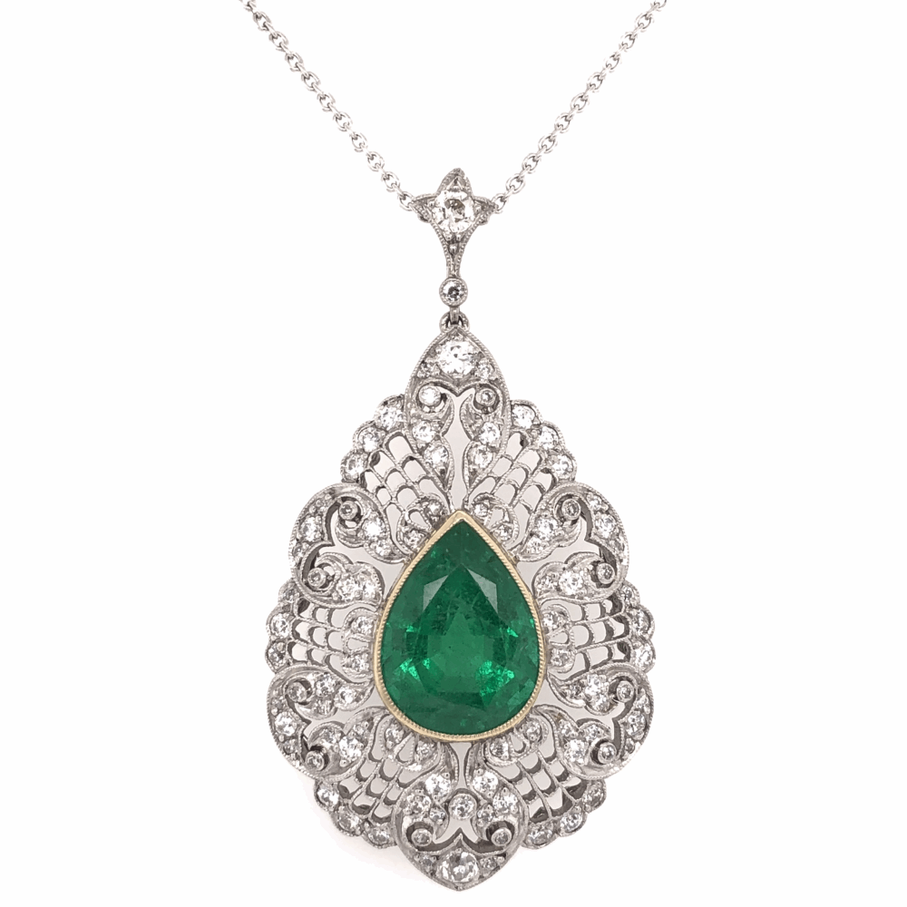 GIA# 1196303013
Treatment F2
Origin Zambia
1.75” tall x 1” wide Platinum & 18K Yellow Gold 5.10ct Pear Shape Emerald GIA & 1.50tcw Diamond Pendant 16" Chain