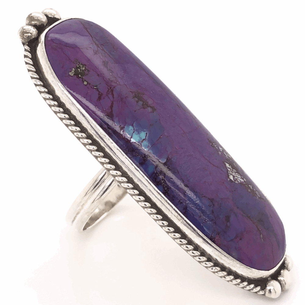Open Shank is sizeable. Size 8.<div style="position: initial; margin: initial;"><span style="font-size: 16.8px; position: initial; margin: initial;"> signed, A F, 13.3g, s8, 2" Wide</span><br style="position: initial; margin: initial;"></div> 925 Sterling Vintage Native Long Purple Stone Ring