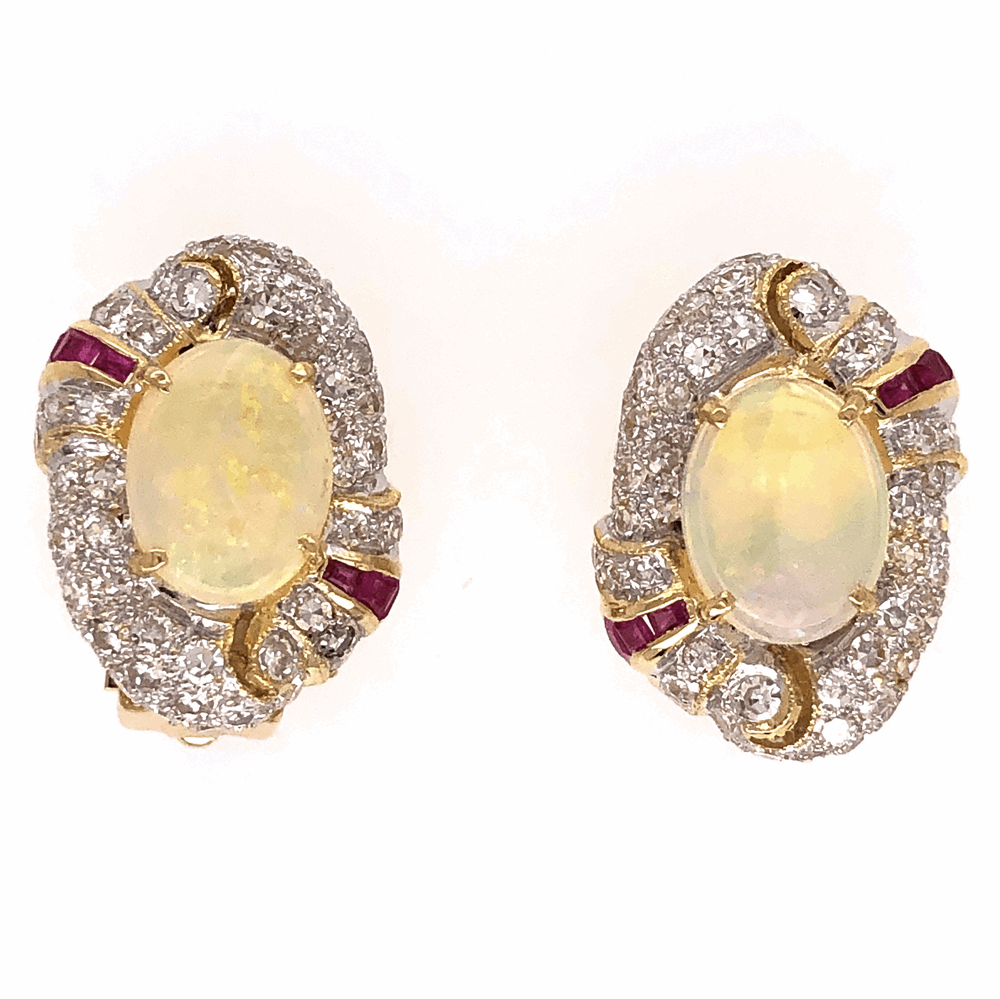 French Clips
1960's 18K Yellow Gold (2)2.00tcw W. Opal and 1.75tcw diamond earrings with rubies