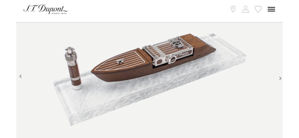 <p>This collectors set from S. T. Dupont features both the Seven Seas Ligne II Cigar lighter and matching cigar punch. Both fit nicely into the larger, motorboat shaped display stand, which itself sits on a crystal block styled after ocean waves.</p>
<p>High quality crystal base with wave effect and genuine oak wood display. Brown suede serves to protect the cigar lighter whilst it is on display; this set also includes palladium finished nautical details. Includes matching seven seas themed cigar punch with nautical detailing.</p>
<p>Storage space for the small nautical cords. The rear of the 'boat' features a stainless steel engraving plate. The entire set ensemble resembles a small motorboat, perfect to suit the Seven Seas theme.</p> S. T. Dupont Seven Seas SMOKING KIT Ligne 2 Prestige Cigar Lighter Set