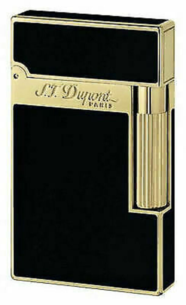 For the cigar lover who cares only for the best, these lacquer-rich lighters are the obvious choice. The quality of an S.T. Dupont lighter combined with the pleasure of smooth layers of lacquer will transform your cigar ritual into an art. Choose from either a palladium or gold finish, and relish the dual-flame cigar burner after you've signaled the beginning of your personal enjoyment with the classic Dupont "ping." MANUFACTURERS WILL ONLY HONOR WARRANTIES ON PRODUCTS PURCHASED FROM AN AUTHORIZED DEALER. DON'T GET BURNED, BUY AUTHORIZED. S.t. Dupont Ligne 2 Lacquer Gold Lighter - 16884