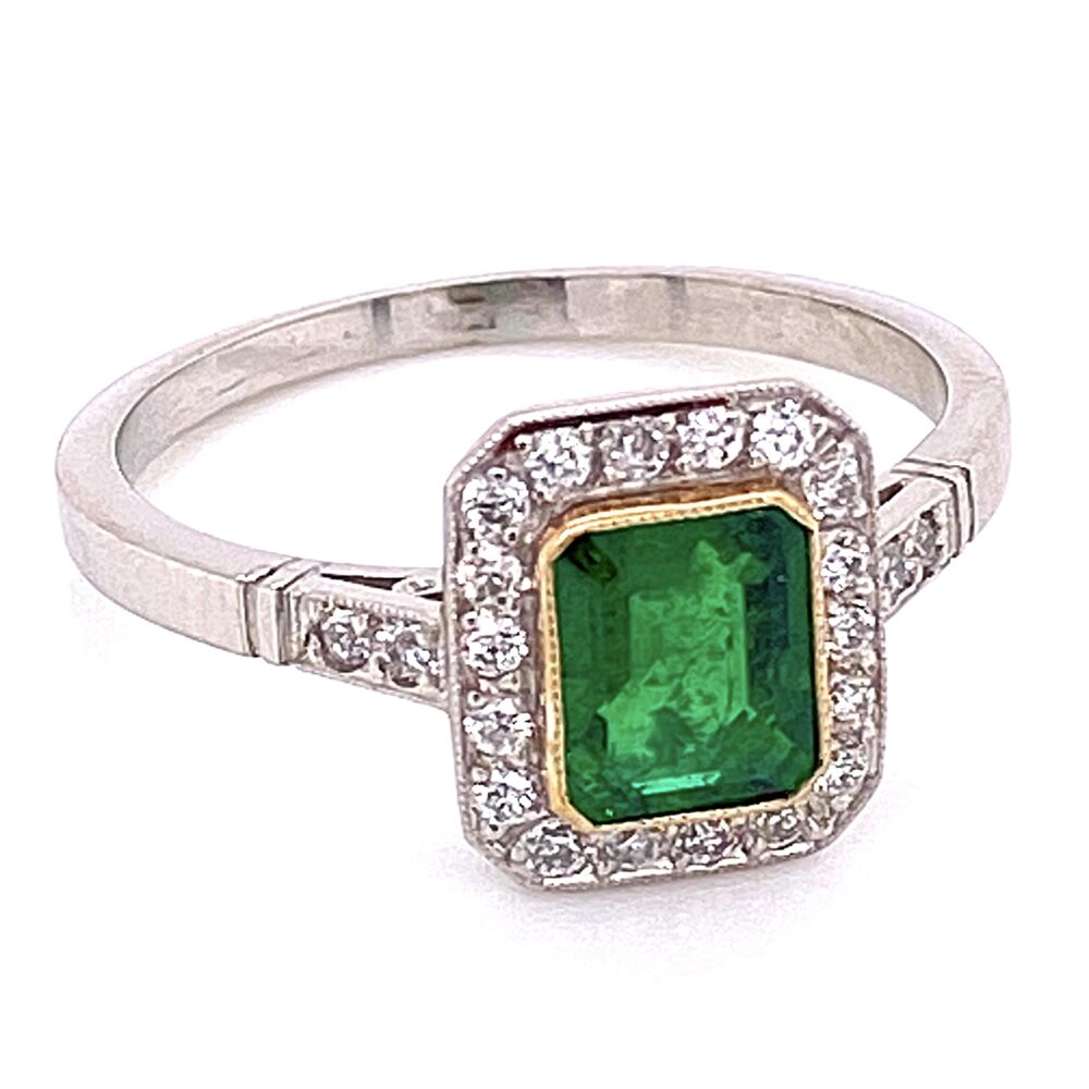 This exceptional platinum ring features a 1 carat gorgeously green emerald with a accented diamond halo, as well as diamonds going down each side on the band. The total diamond weight is.24 carats, making this the perfect statement to make everyday. Platinum Emerald & Diamond Ring