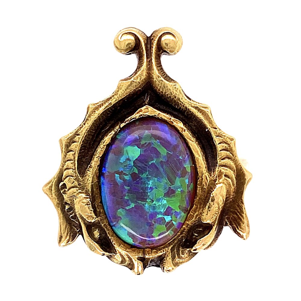 The amazing blue-green Australian Lightning Ridge Black Opal is set in a period correct 1930's Ring with an abstract shape of leaves shaped like wings.<div style="position: initial; margin: initial;"><span style="font-size: 16.8px; position: initial; margin: initial;"><a href="https://youtu.be/0lp46Tb8KYw" title="https://youtu.be/0lp46Tb8KYw" style="text-decoration: none;">https://youtu.be/0lp46Tb8KYw</a></span><br style="position: initial; margin: initial;"></div> 18K YG Arts & Crafts Black Opal Ring 6.4g, s6