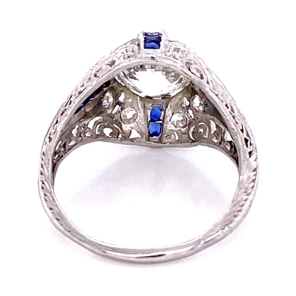 This Platinum Art Deco original hand made ring is gorgeous and has a rare GIA certified H color, clean old european cut diamond weighing a lucky 2.22ct! Beautiful blue sapphire and accent diamonds along with milgrain make this ring a definite stunner! Have the GIA lab report for the old european cut center is an added bonus.
GIA# 2201447603
H-VS1 Platinum Art Deco 2.22ct GIA H-VS1 OEC & .22tcw Diamond Ring, s6.5