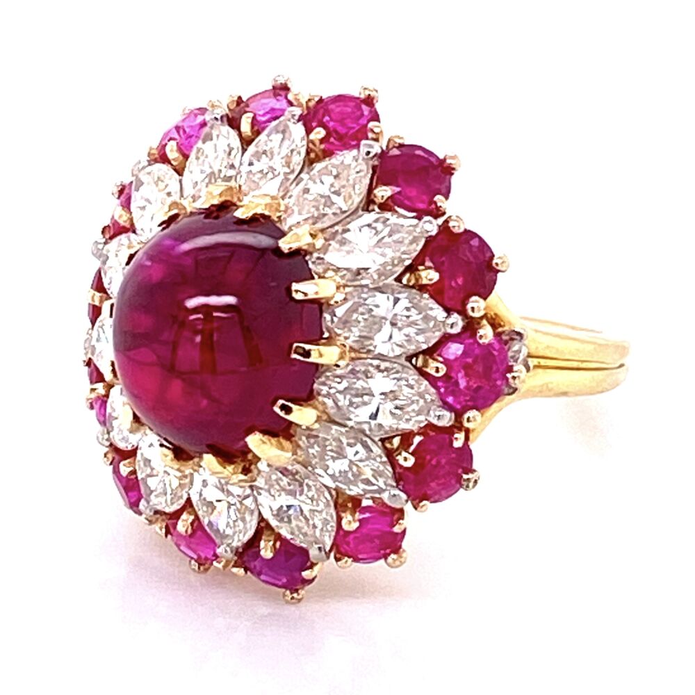 <p>This is a very finely made ring! In fact, we are very surprised that we couldn't find any designer hallmarks. The quality is of Harry Winston, Hammerman Bros or Oscar Heyman.</p>
<p>The center stone has been removed and replaced to get the exact weight of 4.91ct. The bombay style ring has the center ruby surrounded by a row of fine quality round brilliant diamonds weighing approx. 1.50tcw and outside of the diamonds are approx. 2tcw of rubies.</p>
<p>This was sent to GIA# 6204539439 which concluded the center as a natural untreated and UNHEATED Red Ruby from the famous mine in Burma. The most expensive rubies on the market today are unheated rubies from Burma making this a very special ring!</p> Very Fine 4.91ct Ruby Cabochon BURMA NO HEAT GIA & 1.50tcw Diamond Ring