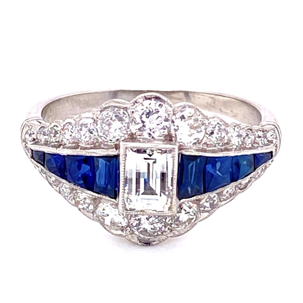 <div><p>The center natural diamond in this ring is a thing of wonder; the checkerboard cut on top and the step cut sides make it a very unusual cut that is rare and this .51ct specimen is so cool to see.</p></div><div><br></div><div><p>It is set in a handmade platinum ring that tapers to the shank. Has a center row of 1.00tcw French cut sapphires and .90tcw diamonds on both side following the taper making it elegant and crisp!</p></div> Platinum .51ct Checkboard Diamond & 1tcw Sapphire Ring with .90tcw side diamonds