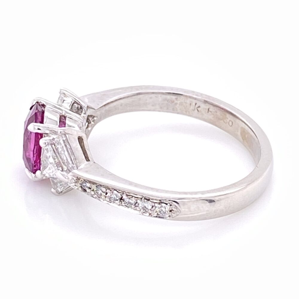 Spark uses only the finest color and this 1.21ct Oval Pink Sapphire is no exception. The 950 Platinum ring is stamped 950 and SPARK and has multiple fancy shape diamonds weighing about .66tcw. Platinum SPARK Pink Sapphire and Fancy Diamond Ring. s6.5