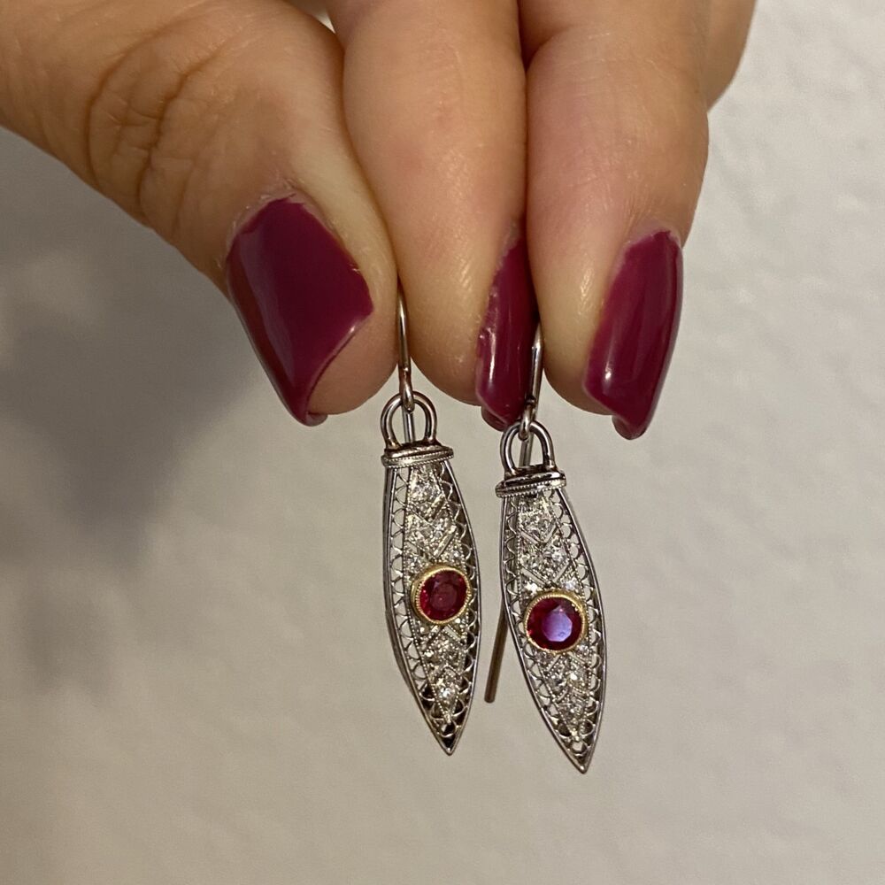 These Art Deco earrings have filigree & milgrain has 2 rubies are aprox. .40tcw & .12tcw diamonds. Platinum Art Deco Long Dangling Earrings on Wire with Ruby & Diamonds 5.0g
