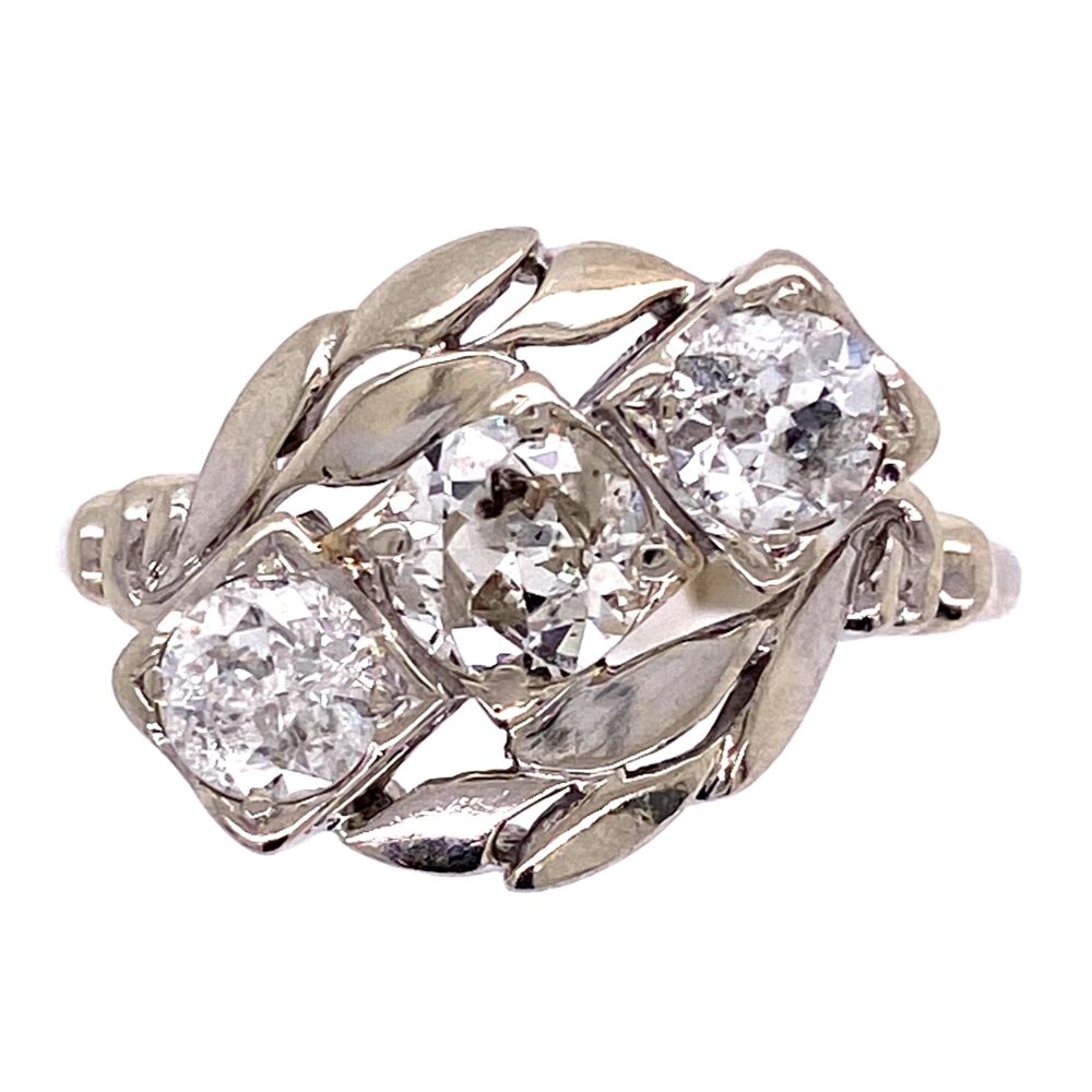 Three beautiful Old European Cut Diamonds measure to weigh approx. 1.58tcw. The Diamonds are set on a bias and have a leaf design on each side! 14K WG 1950's 3 Diamond Ring 1.58tcw with Leaf Design 3.6g, s10