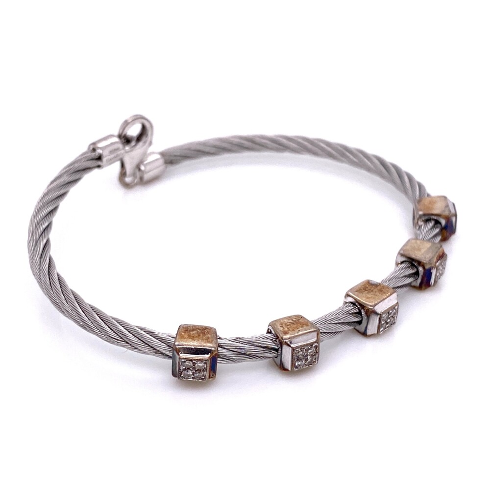 Diamond Weight: 0.11tcw
Division: Gabriel Silver
Collection: Steel My Heart
Style: Twisted Cable
Diamond Color: Faint Color
Diamond Clarity: SI2 Clarity Gabriel & Co 925 Silver & Stainless Steel Diamond Bangle