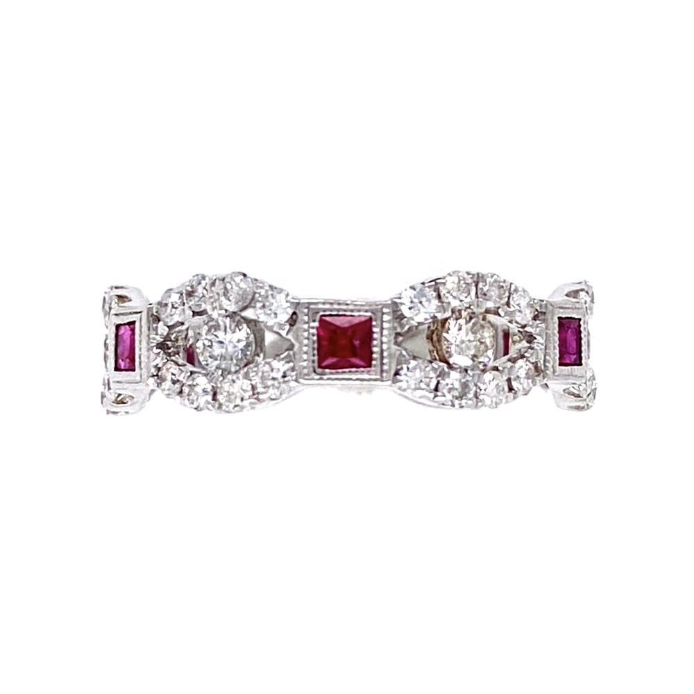 36 round brilliant diamonds approx. .55tcw in four stations are separated by square cut rubies approx. .15tcw<div style="position: initial; margin: initial;"><br style="position: initial; margin: initial;"></div><div style="position: initial; margin: initial;"><span style="font-size: 16.8px; position: initial; margin: initial;"><a href="https://youtu.be/eQCbdKip58Q" title="https://youtu.be/eQCbdKip58Q" style="text-decoration: none;">https://youtu.be/eQCbdKip58Q</a></span><br style="position: initial; margin: initial;"></div> 14K WG Designer .55tcw Diamond Band with Rubies 3.7g, s6.5