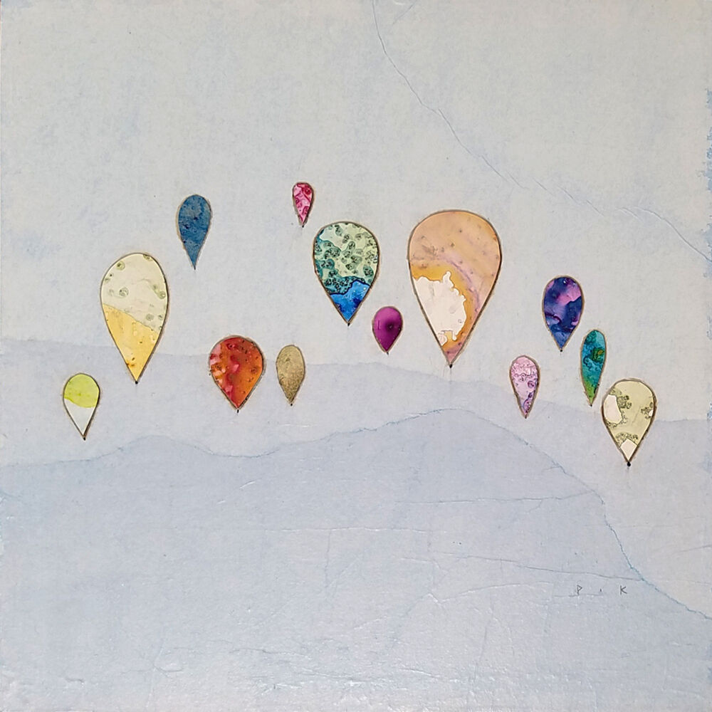 This mixed media on wood panel wall art by Peter Kuttner is a lively and colorful piece with intoxicating texture and depth. Part of the artist’s Cut-Out series, Globe Trotting resembles balloons flying high over a landscape. Globe Trotting