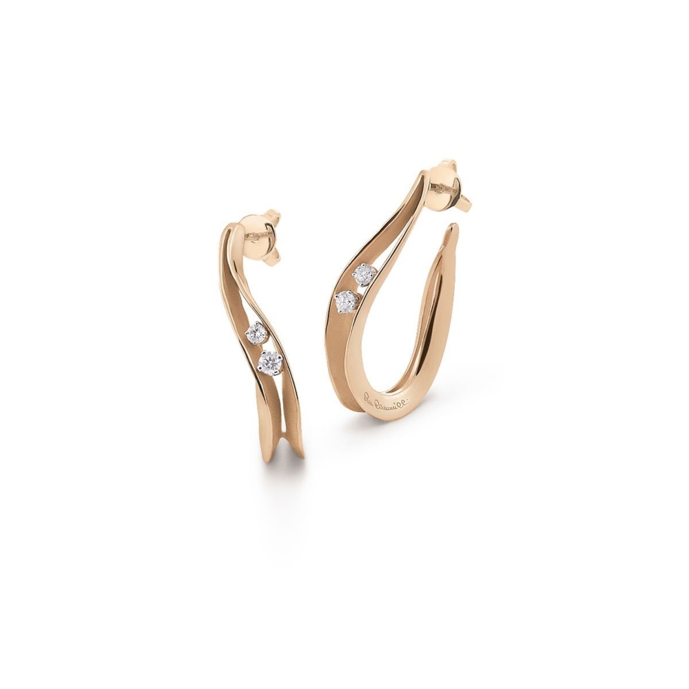 These attention-grabbing earrings brought to you by Annamaria Cammilli bring unmatched elegance. They feature a hoop design, two diamonds and a heart-stopping orange gold hue. Hoop Earrings (Orange Gold)