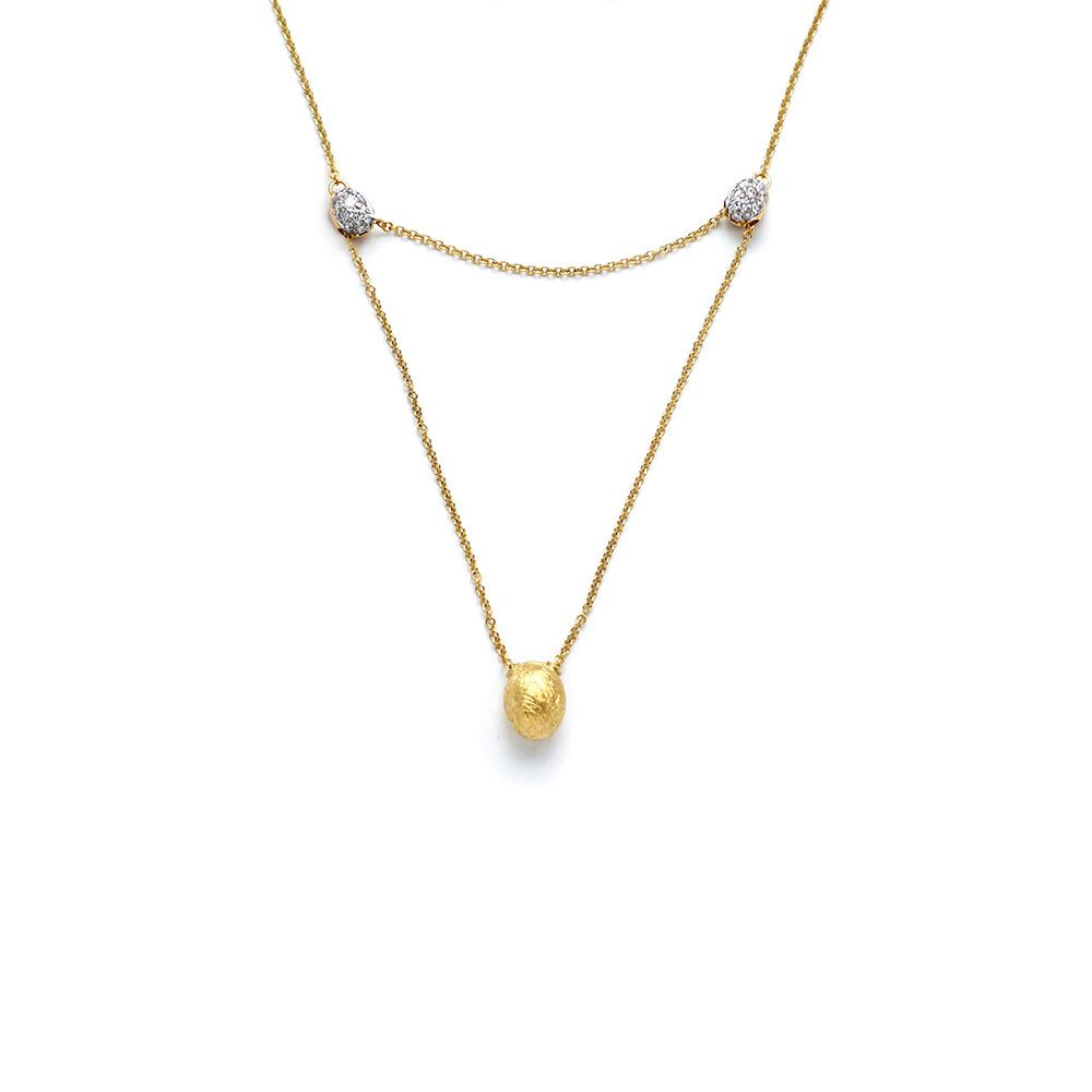 This incredibly lovely 18K yellow gold necklace brought to you by Nanis Fine Jewelry and Italian designer Laura Bicego brings remarkable distinction. Dancing In The Rain 3-bead Necklace