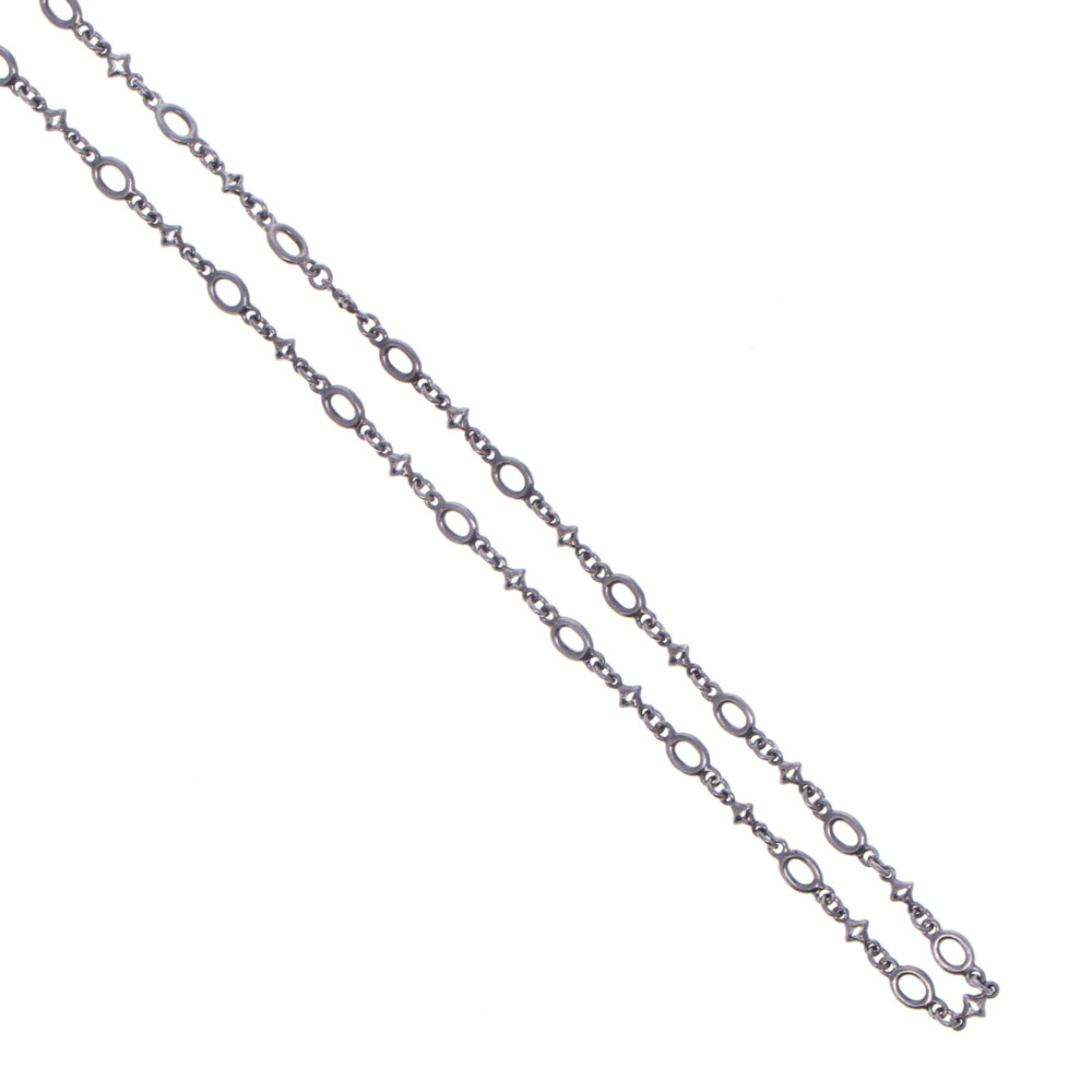 This handcrafted polished Rhodium Sterling oval & tiny star chain is delicate and decorative. This chain is one of the smallest gauges of chain in the collection. The clasp is 14k gold 2.18g and has a 7mm opening. Polished Oval & Tiny Star Link Chain