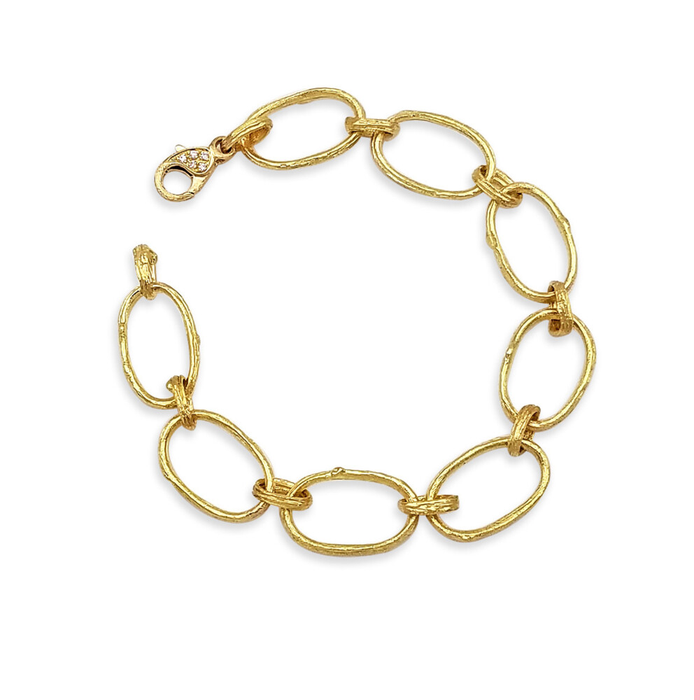 This 19K yellow gold bracelet brought to you by Aaron Henry Designs features a large and extra small open olive branch link and 18K yellow gold lobster with 0.075 ct diamonds. Olive Branch Link Bracelet