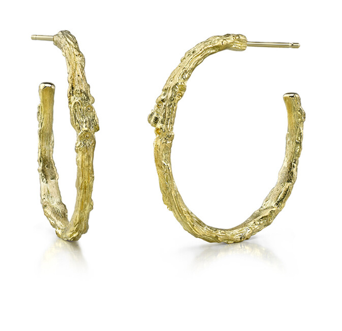 These jaw-dropping 19K yellow gold earrings brought to you by Aaron Henry Designs bring unrivaled beauty. They feature a conversation-sparking branch hoop design. Branch Hoop Earrings