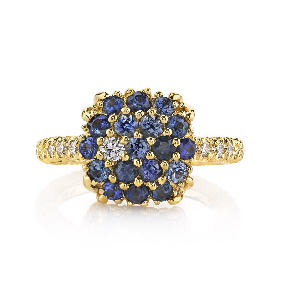 This truly amazing19K yellow gold ring brought to you by Aaron Henry Designs brings unrivaled elegance. It features a sparkling 1.32 carat blue sapphire and 0.06 carat diamond pave top with 0.12 carat diamond sides. Blue Sapphire Ring With Diamonds