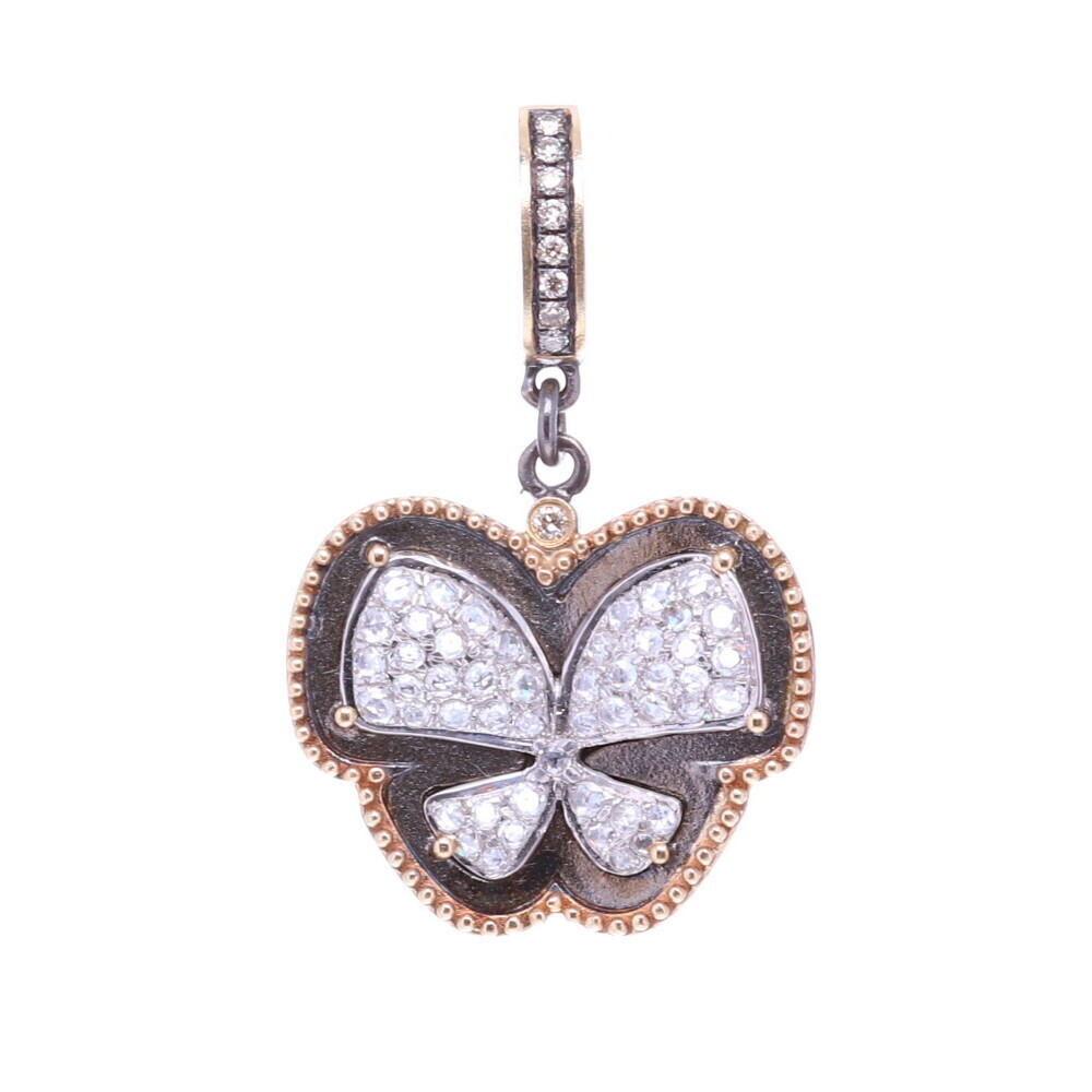 The butterfly is the symbol of resurrection and eternal life because they metamorphose from a caterpillar to a chrysalis and finally becomes a butterfly. Many believe that the soul left the body in the form of a butterfly. Aristotle named the butterfly 'psyche' which is the Greek word for Soul. This pendant has 3.6g 14k yellow gold, Diamonds 0.5 tcw, and rhodium sterling silver. The bale has a 4mm opening. Diamond Butterfly Pendant