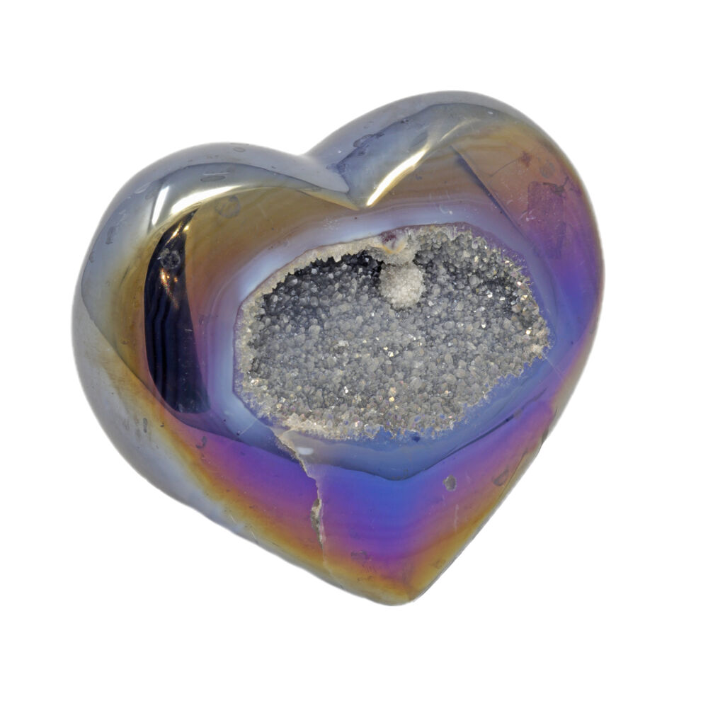 There is a beautiful color combination in this iridescent heart shaped druze Agate. This druze Agate has a grey colored druze center with a small white colored druze ball in the upper center of the druze pocket. Druze is a formation of tiny crystals on the surface, or in the center of a larger crystal. Surrounding this druze pocket is a blue/grey band of Agate with an iridescent coating. Agate Geodes are powerful crystals for good luck, protection and spiritual growth. The iridescence you see is a process of metal vapor deposition inside a vacuum chamber. The type of metals range from titanium to silicone oxide. The colors are produced by heating the solid metal in an arc and turning it into vapor, where it physically bonds to the crystal surface. The crystals themselves are real and the rainbow color on the outside is the metal. Even though these crystals are enhanced with metal, they are still all comprised of components from Mother Earth. Iridescent Heart -Indigo Agate with White Pop Of Druze