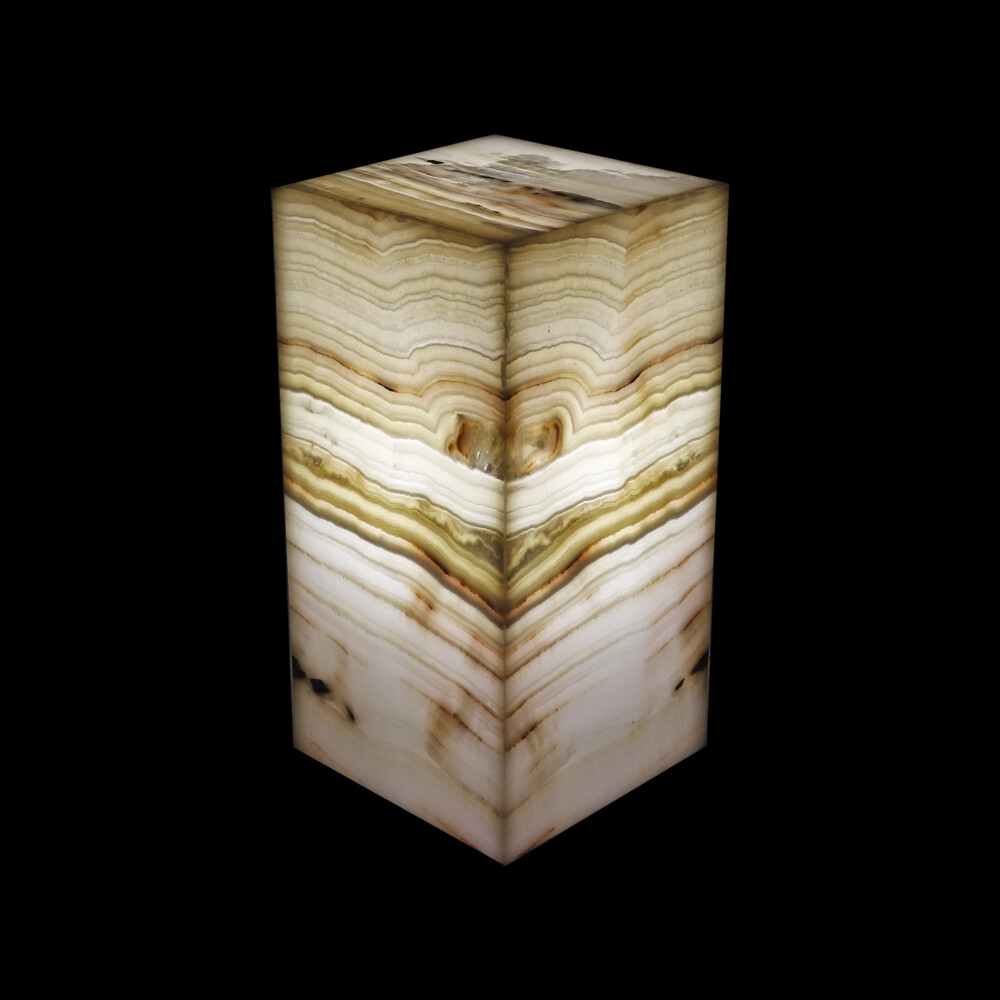 <span style="position: initial; margin: initial;"></span><span style="font-family: "EB Garamond"; position: initial; margin: initial;">Onyx Luminary - 6" Sq. X 12" Amber.</span><div style="position: initial; margin: initial;"><p style="margin: initial; font-variant-numeric: normal; font-variant-east-asian: normal; font-stretch: normal; line-height: normal; font-family: "EB Garamond"; color: rgb(0, 0, 0); position: initial;"><span style="position: initial; margin: initial; font-family: "EB Garamond";"><font size="4">Hand-crafted luminaries </font></span><span style="font-size: 1.2rem;">are as unique as each Being on earth.</span></p><p style="margin: initial; font-variant-numeric: normal; font-variant-east-asian: normal; font-stretch: normal; line-height: normal; font-family: "EB Garamond"; color: rgb(0, 0, 0); position: initial;"><font size="4">Formed of translucent bands of chalcedony and sometimes travertine</font></p><p style="margin: initial; font-variant-numeric: normal; font-variant-east-asian: normal; font-stretch: normal; line-height: normal; position: initial;"><font style=""><font color="#000000" face="EB Garamond" size="4">marble, in alternating colors. Onyx consists of fine </font><font color="#000000" face="EB Garamond"><span style="font-size: 16.8px;">inter-growths</span></font><font color="#000000" face="EB Garamond" size="4"> of the</font></font></p><p style="margin: initial; font-variant-numeric: normal; font-variant-east-asian: normal; font-stretch: normal; line-height: normal; font-family: "EB Garamond"; color: rgb(0, 0, 0); position: initial;"><font size="4">silica minerals quartz and morganite. These properties allow the</font></p><p style="margin: initial; font-variant-numeric: normal; font-variant-east-asian: normal; font-stretch: normal; line-height: normal; font-family: "EB Garamond"; color: rgb(0, 0, 0); position: initial;"><font size="4">luminaries to glow beautifully from within, providing soothing</font></p><p style="margin: initial; font-variant-numeric: normal; font-variant-east-asian: normal; font-stretch: normal; line-height: normal; font-family: "EB Garamond"; color: rgb(0, 0, 0); position: initial;"><font size="4">ambiance. The material is slabbed from one solid boulder, then hand</font></p><p style="margin: initial; font-variant-numeric: normal; font-variant-east-asian: normal; font-stretch: normal; line-height: normal; font-family: "EB Garamond"; color: rgb(0, 0, 0); position: initial;"><font size="4">matched for optimal balance and symmetry. The stone is sourced from</font></p><p style="margin: initial; font-variant-numeric: normal; font-variant-east-asian: normal; font-stretch: normal; line-height: normal; font-family: "EB Garamond"; color: rgb(0, 0, 0); position: initial;"><font size="4">the Southern Interior Region of Mexico. Invite one into your home</font></p><p style="font-variant-numeric: normal; font-variant-east-asian: normal; font-stretch: normal; line-height: normal; font-family: "EB Garamond"; color: rgb(0, 0, 0); position: initial; margin: initial;"><font size="4">today, and experience it for yourself! Stunning in any room you put them in. </font></p></div> Onyx Luminary - 6" Sq. X 12" Amber
