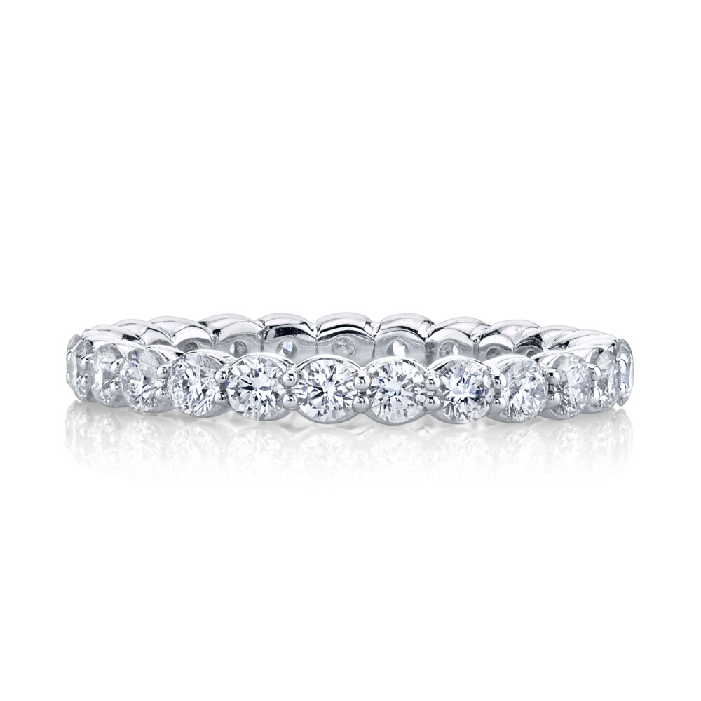SIMPLE AND CLASSIC SLOANE STREET WHITE DIAMOND ETERNITY BAND FEATURES A SIGNATURE BASKET SETTING WITH SHARED PRONGS IN 18K WHITE GOLD. IMPACTFUL ENOUGH TO WEAR ON ITS OWN WITH EACH DIAMOND MEASURING ABOUT 2.2MM, OR STACK IT UP TO ADD EXTRA SPARKLE TO YOUR EVERYDAY LOOK. Pave Diamond Eternity Band